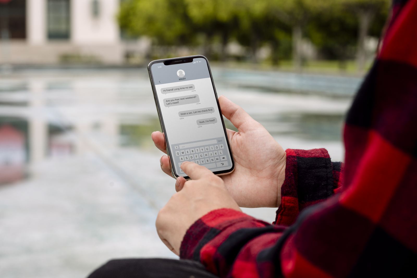 Girl reading text messages from a friend