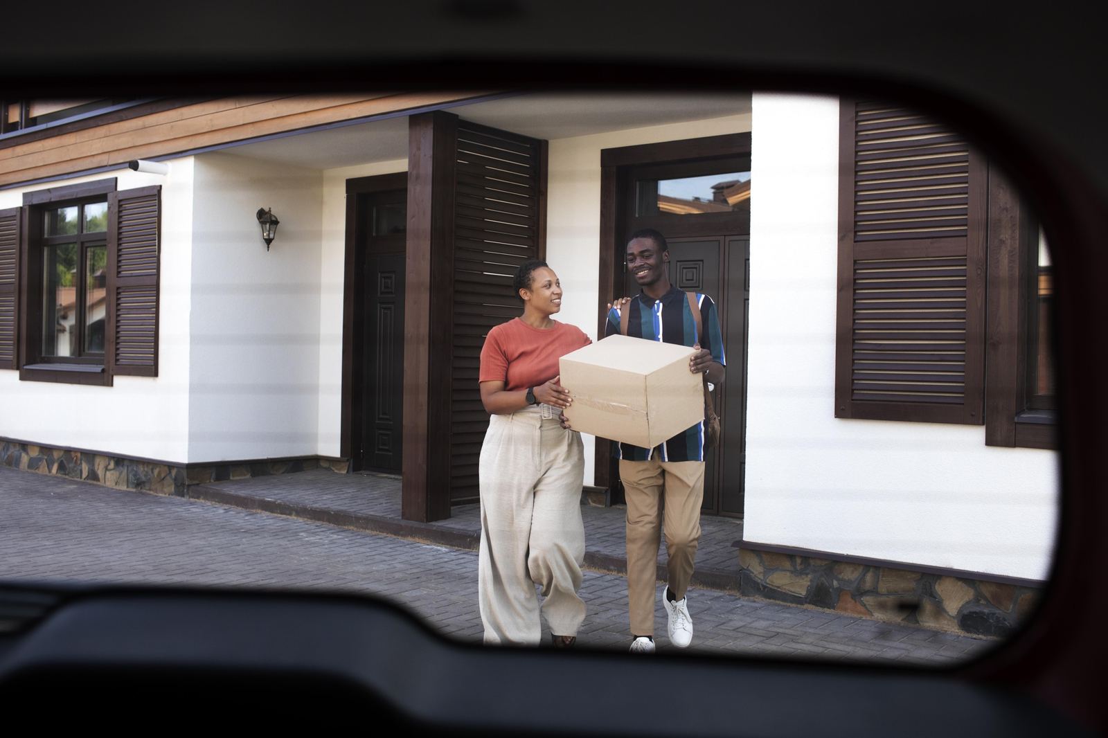 Young adult moving from his parents house